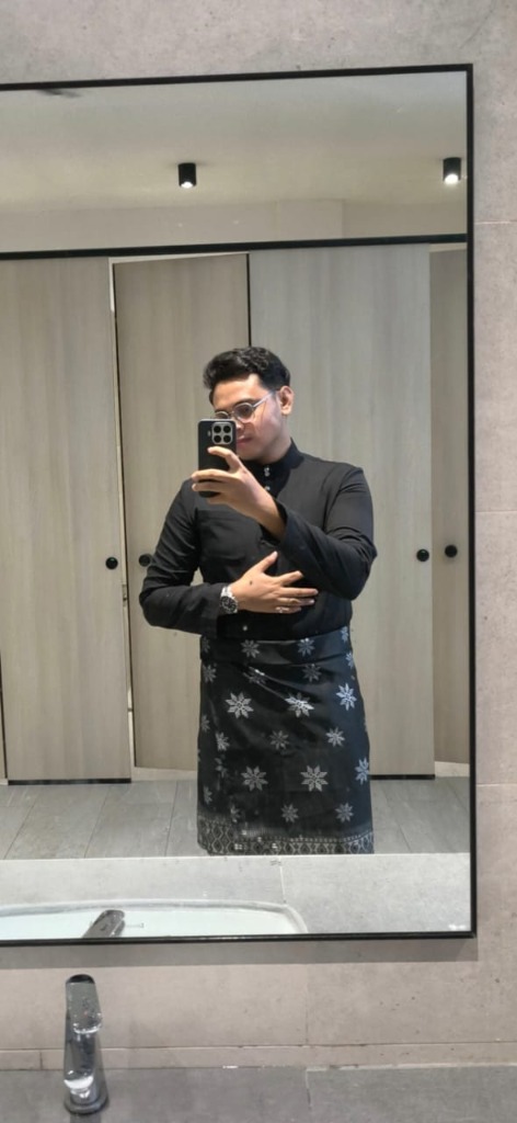 Muhammad Aiman Hakim working as a software engineer